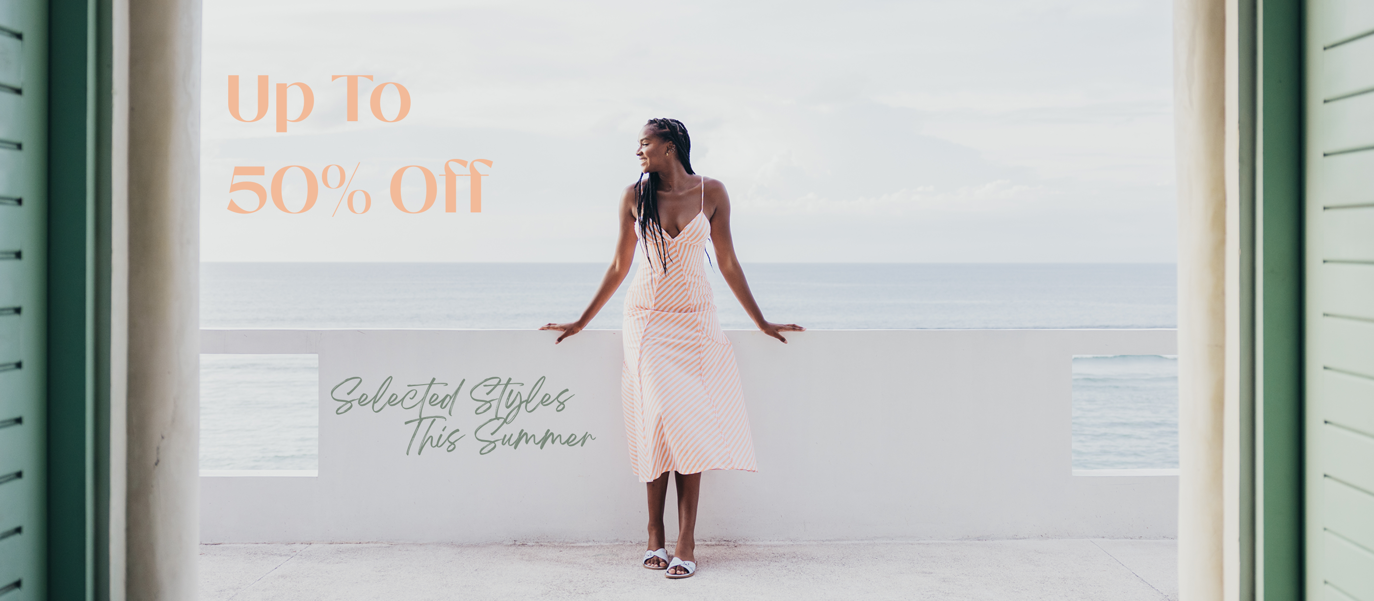 Woman in a light striped dress standing by a window with promotional text overlay